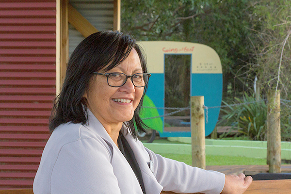 Mary Mackey VIO in front of Caravan 1 600x401